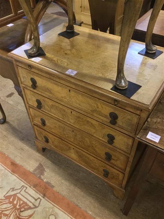 A small reproduction walnut chest with slide